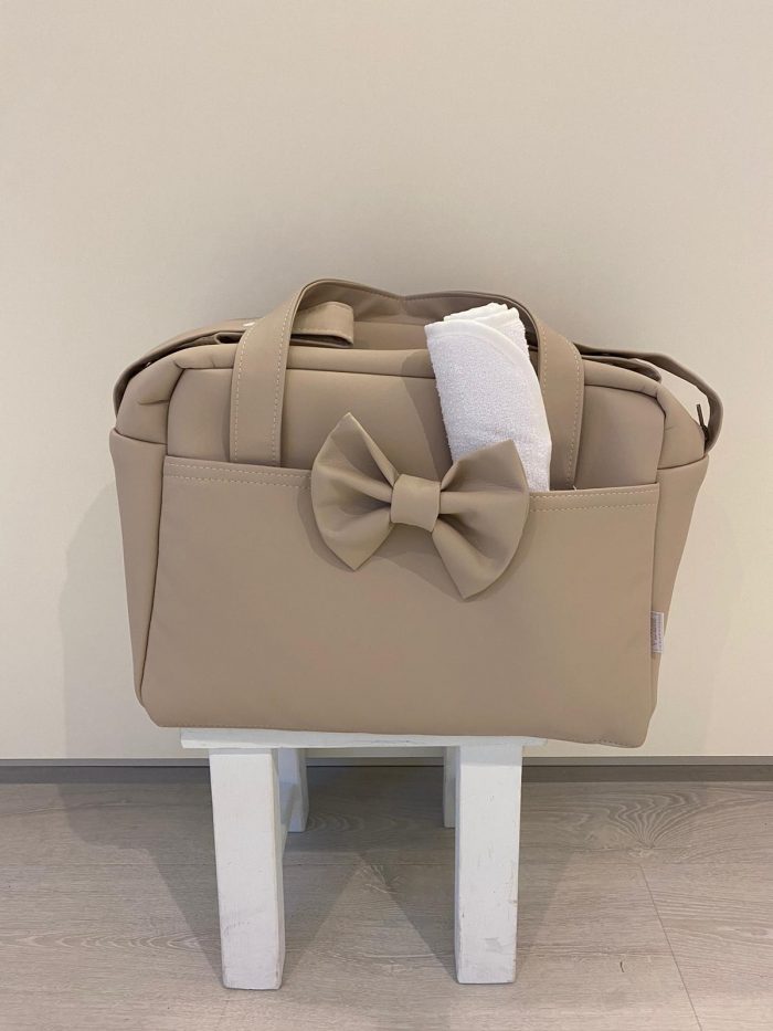 Uzturre luiertas met strik beige